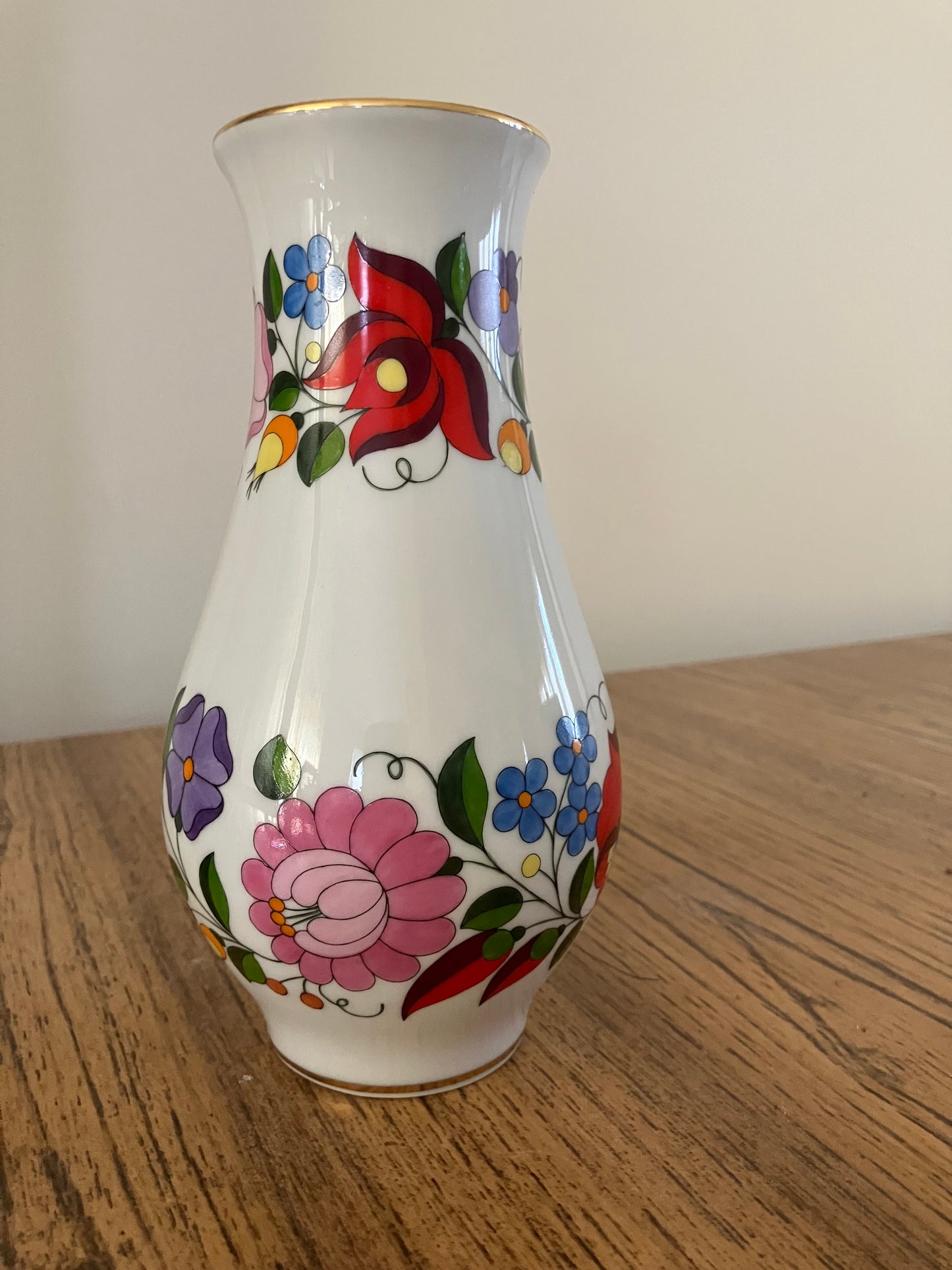 Rare Vintage Hungarian Kalocsa Porcelain Vase – Hand-Painted Traditional Floral Motifs with Gilt Rims, 7.5"  Description:
