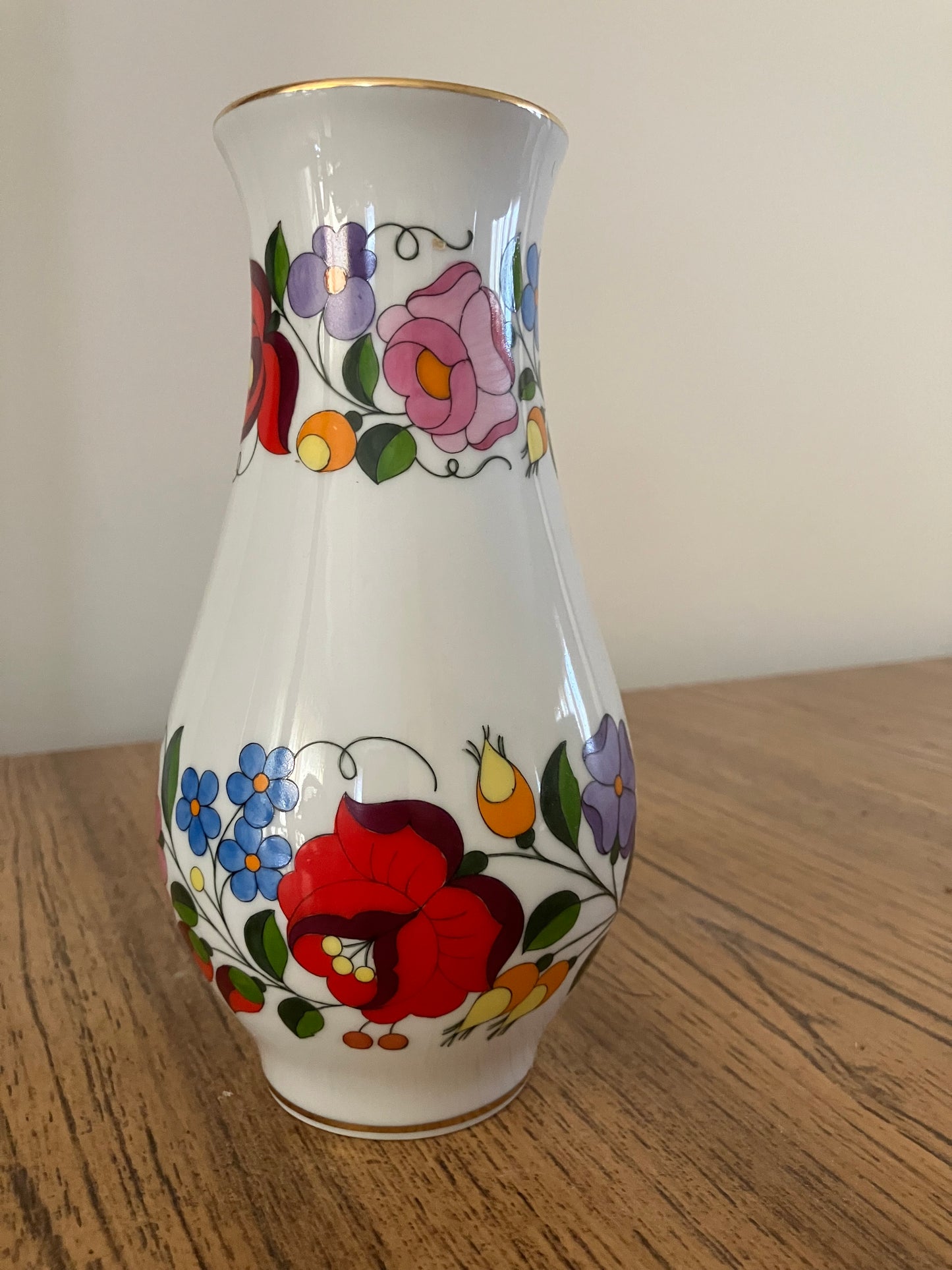 Rare Vintage Hungarian Kalocsa Porcelain Vase – Hand-Painted Traditional Floral Motifs with Gilt Rims, 7.5"  Description: